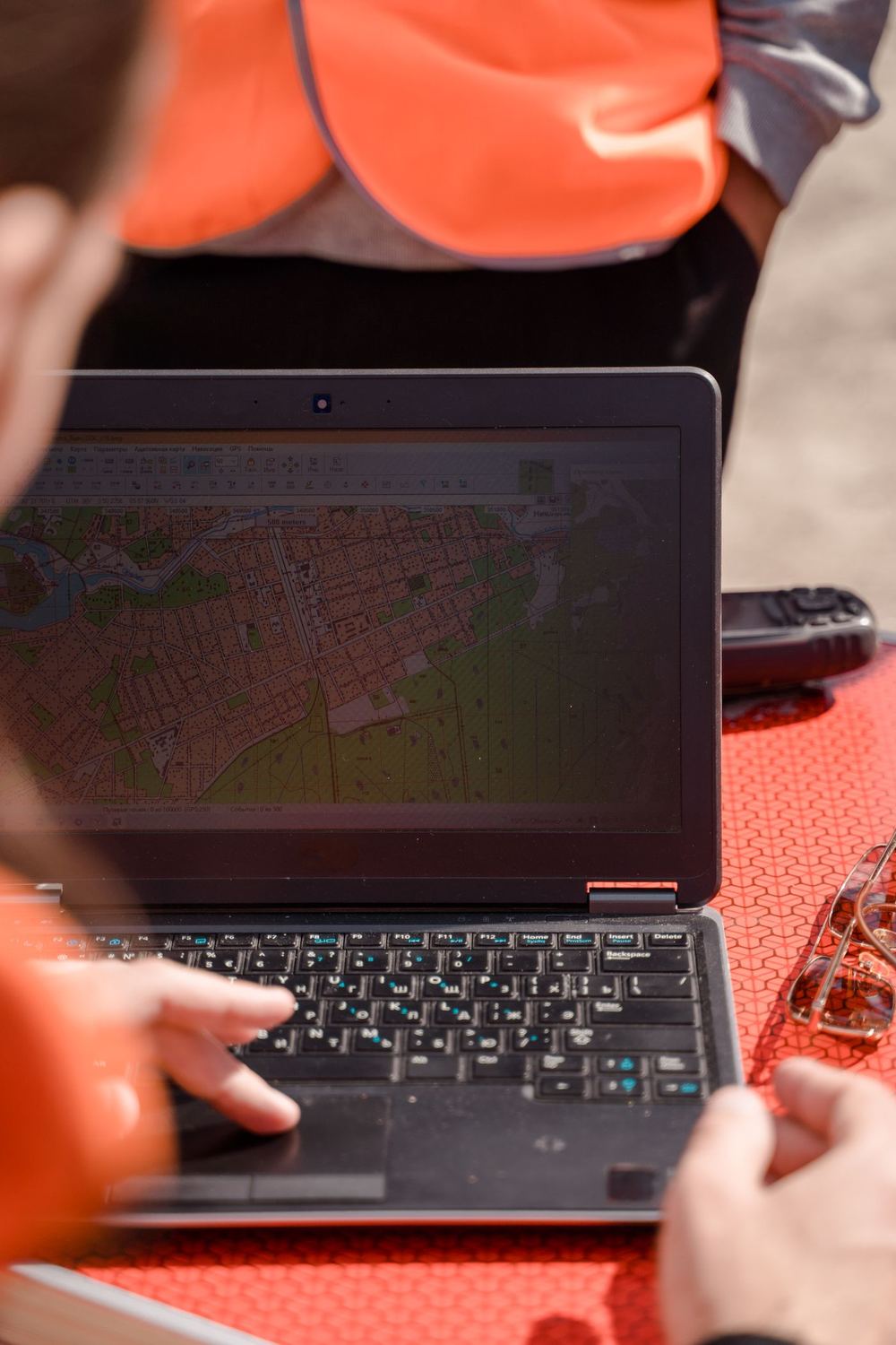 Field worker reviewing job data on site